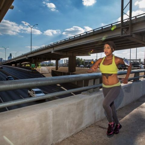 african-american-endurance-female-athlete-running-on-downtown-bridge-in-urban-city-model-released_t20_8BQbkV