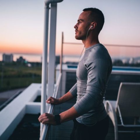 music-balcony-rooftop-headphones-man-home-young-thinking-active-wear-listening_t20_293gdV